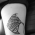 Kleines typisches Tribal Tattoo mit schwimmendem Rochen