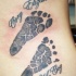 Tatuaje  de huellas de un niño