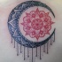 bellissimo rosso nero sole luna mandala tatuaggio