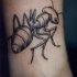 Tatuaje en la pierna, hormiga gruesa espantosa
