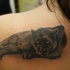 incantevole riposo pantera tatuaggio sulla scapola