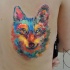 Tatuaje  de lobo de acuarelas en la espalda