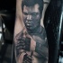 Tatuaje en la pierna, retrato de boxeador Muhammad Ali
