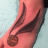 Tatuaje en el pie, pelota pequeña de Quidditch