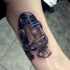 Tatuaje en el brazo, robot R2D2 precioso 3D