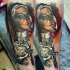 Marvelous colored forearm tattoo of creepy Mexican woman with cross