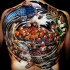 Marvelous neo japanese style colored whole back tattoo of various fishes and chrysanthemum flower