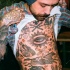 Montón de tatuajes increíbles en todo el cuerpo