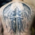 Massive multicolored very detailed whole back tattoo of hole angel warrior