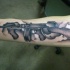 Medium size black and gray style forearm tattoo of Tommy gun