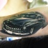 Medium size colored arm tattoo of classic car
