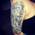 Medium size shoulder tattoo of antic Aquarius statue with trees
