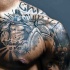 Memorial style black ink glorious Spartan army tattoo on chest with date
