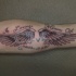 Denkwürdiges Flügel Tattoo am Arm für Männer