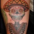 Tatuaje  de esqueleto mexicano en sombrero y con bandolera