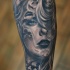 Mexican traditional black and white forearm tattoo of woman portrait