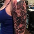 Mexican traditional colored forearm tattoo of woman portrait