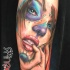 Mexican traditional colorful seductive woman portrait tattoo on forearm