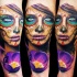 Mexican traditional style colored arm tattoo of woman face with flower