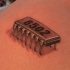 microchip disadattato tatuaggio su schiena