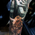Minotaur and labirinth tattoo on forearm