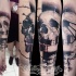 Modern style detailed forearm tattoo of human skeleton with nail