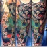 Modern traditional style colored arm tattoo of sweet looking cat with Egypt symbols