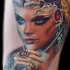 Modern traditional style colored tattoo of woman with owl