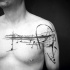 Tatuaggio di note di clavicola con inchiostro nero a tema musicale