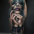 Mysterious detailed colorful tattoo of woman with tied hands