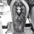 Mystical black and white detailed demonic goat tattoo on thigh