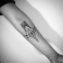 Mystical black ink geometrical style forearm tattoo