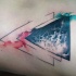 Mystical black ink triangle shaped colored tattoo stylized with moon surface