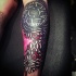 Mystical fantasy style colored leg tattoo of various ornaments