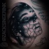 Mystical illustrative style chest tattoo of demonic woman portrait
