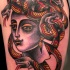 Mystique colored Gorgon Medusa shoulder tattoo in original old school style
