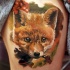Natural looking colored thigh tattoo of funny fox