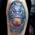 Neo japanese style colored shoulder tattoo of daruma doll with symbol