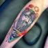 Neo traditional style colored leg tattoo of ancient statue with jewelry and eye
