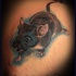 Neo traditional style colored scapular tattoo of small cute mouse