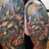 Neo traditional style colored shoulder tattoo of evil werewolf with big moon