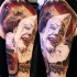 nuovo stile pagliaccio cattivo tatuaggio colorato su braccio
