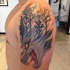 New school illustrative style demonic wolf with forest tattoo on shoulder