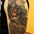 Tatuaje en el brazo, la santa muerte, estilo new school