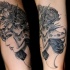New school style black ink forearm tattoo of woman in great helmet