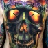 New school style colored chest and belly tattoo of big human skull