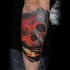 New school style colored forearm tattoo fo human skull and burning candles