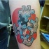 New school style colored forearm tattoo of puzzle pieces