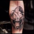 New school style colored forearm tattoo of funny bear with lettering