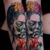 New school style colored forearm tattoo of woman face with flowers